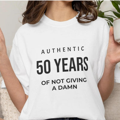 50 Years of Not Giving a Damn T-Shirt β Funny 50th Birthday Tee M-XL white