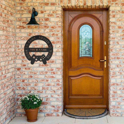 Personalized Born to Game Metal Sign - displayed on brick wall next to door | Our Phoenix Rise