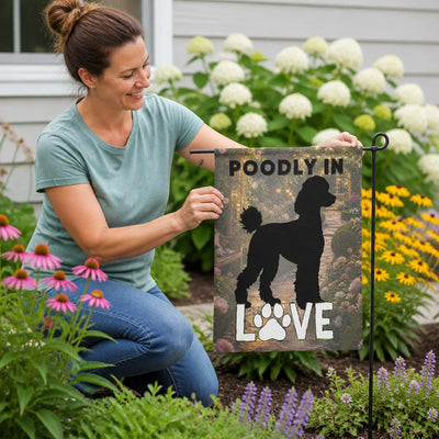 Poodle Silhouette Garden Flag - Lifestyle Mockup in Outdoor Garden Setting | Our Phoenix Rise