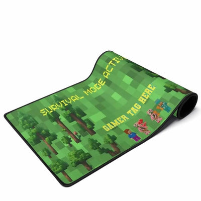 Block World Gaming Desk Mat - Full View of Pixelated Forest and 'Survival Mode Active' Text | Our Phoenix Rise