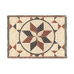 Beige woven throw blanket with blue and brown geometric star pattern top view | Our Phoenix Rise