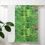 Personalized Survival Mode Pixel Gamer Bath Towel - Hanging on a Bathroom Rail with Green Pixel Pattern | Our Phoenix Rise