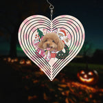 Personalized Pet Photo Christmas Heart Wind Spinner - Angled view against blurred background | Our Phoenix Rise