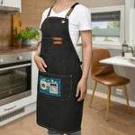 Personalized Dad Apron with Tools Design - Black Worn by Woman in Kitchen | Our Phoenix Rise