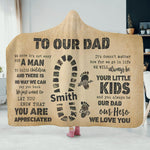 Personalized Dad Hero Hooded Blanket - close up of 'William' and 'Emily' names with small footprints | Our Phoenix Rise