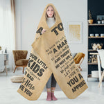 Personalized Dad Hero Hooded Blanket - folded on a bed | Our Phoenix Rise