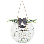Personalized Graduation Welcome Sign Round Door Hanger - close up view with bow and eucalyptus accents | Our Phoenix Rise