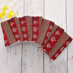 Personalized Christmas Plaid Hand Towel 6-Pack - Stacked with close-up of snowflake and plaid pattern | Our Phoenix Rise