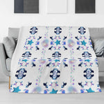 Blue Pink Unicorn Snowflake Flannel Blanket - Draped Over Modern Grey Sofa | Our Phoenix Rise