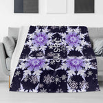 Personalized Snowflake Flannel Blanket - Draped over a gray sofa with custom name Jasmine | Our Phoenix Rise