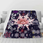 Personalized Snowflake Flannel Blanket - Custom Jasmine blanket on gray sofa close up | Our Phoenix Rise