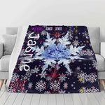 Personalized Snowflake Flannel Blanket - Close-up of name 'Jasmine' on blanket with snowflakes | Our Phoenix Rise