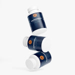 Ashwagandha with Black Pepper Capsules - opened bottle with capsules spilling out | Our Phoenix Rise