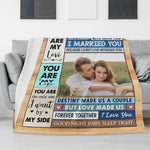 Personalized couple photo blanket draped over a grey sofa in a living room setting | Our Phoenix Rise