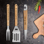 Personalized Grilling Tool Set - fork spatula tongs with custom engraving on dark background with herbs | Our Phoenix Rise