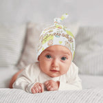Baby wearing a personalized Easter bunny beanie with a name "Emily" | Our Phoenix Rise
