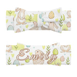 Flat lay of the personalized Easter bunny beanie, headband, and blanket set | Our Phoenix Rise