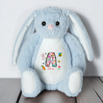Personalized Easter Bunny Plush Toy - Blue close up on wooden surface | Our Phoenix Rise