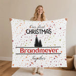Personalized Our First Christmas Flannel Blanket - Couple holding blanket with custom name | Our Phoenix Rise