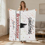 Personalized Our First Christmas Flannel Blanket - Woman holding blanket with festive design | Our Phoenix Rise