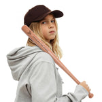 Personalized Mini Wooden Baseball Bat - Child in baseball cap holding bat | Our Phoenix Rise