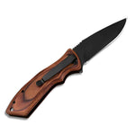 Personalized Engraved Wood Handle Pocket Knife - Close Up Detail of Black Blade and Wood Texture | Our Phoenix Rise