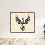 Phoenix Silhouette Woven Blanket - hanging on a white wall, full view | Our Phoenix Rise