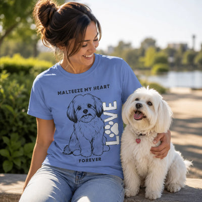 Maltese Dog Lover T-Shirt - Woman wearing light blue tee with Maltese dog | Our Phoenix Rise
