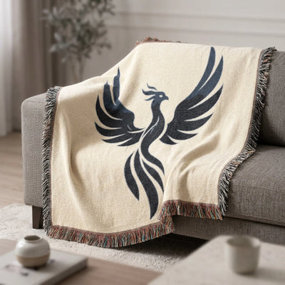 Phoenix Silhouette Woven Blanket - draped on a sofa, close-up | Our Phoenix Rise