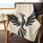 Phoenix Silhouette Woven Blanket - on a chair with light filtering in | Our Phoenix Rise