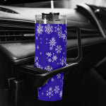 Blue Snowflake 40oz Tumbler with  pattern on a car cup holder