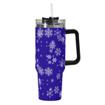 Blue tumbler with white snowflake pattern on a white background