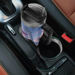 Car cup holder with a blue mug featuring a cartoon character
