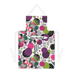 Colorful apron with geometric pattern and 'Kiss the Chef' text on a white background