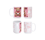 Four mugs with different designs on a white background
