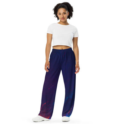 Front view of unisex wide-leg gaming and lounge pants featuring a deep blue galaxy pattern. Relaxed fit premium jersey bottoms.