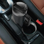 Grim Reaper 40oz Tumbler travel mug with straw in a car cup holder