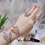 Butterfly Zirconia Pearl Cuff Bracelets and Rings - Pink Gemstones on Hand | Our Phoenix Rise