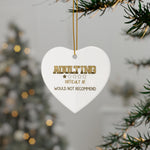 Heart-shaped ornament with 'ADULTING DIFFICULT AF WOULD NOT RECOMMEND' text hanging on a branch.