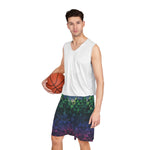 Man holding a basketball wearing a white sleeveless shirt and colorful shorts on a white background