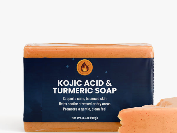 Kojic acid and turmeric soap bar with packaging on a white background
