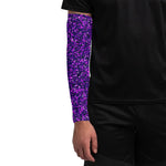 Purple camouflage arm sleeve worn by a person on a white background