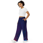 Side profile of unisex gaming pants showing the deep practical pockets and comfortable wide-leg silhouette. Women