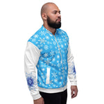 Side view of a man modeling a snowflake-themed light blue jacket with white sleeves and front pockets.