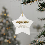 Star-shaped ornament with humorous text hanging on a Christmas tree.
