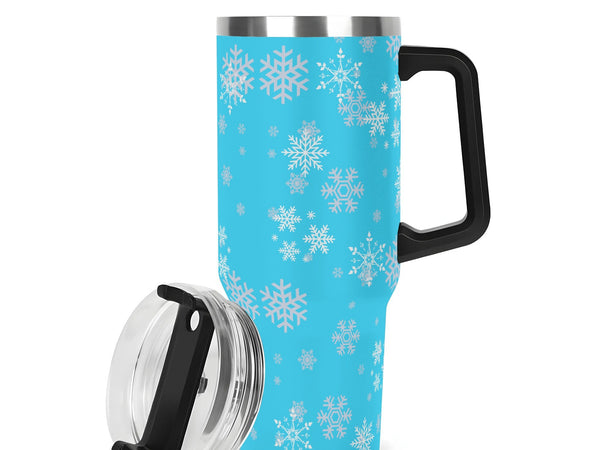 Travel mug with snowflake pattern on a blue background