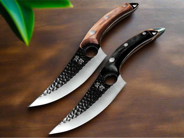 Two knives with black and brown handles on a white background