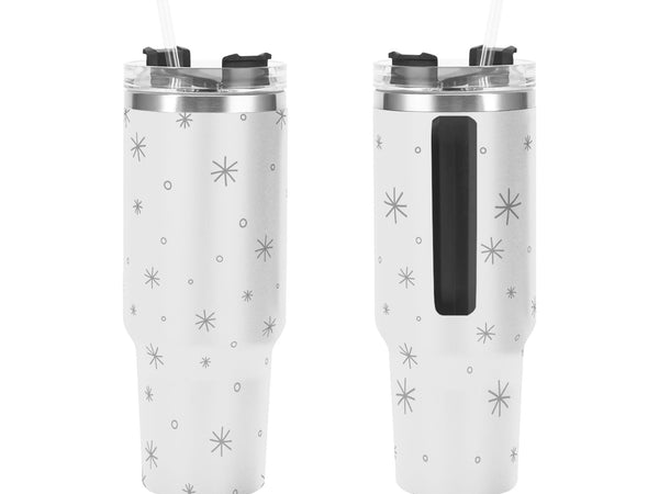 Two white tumblers with star pattern on a white background