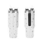 Two white tumblers with star pattern on a white background