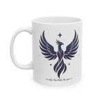 White mug with a black phoenix design and text on a white background